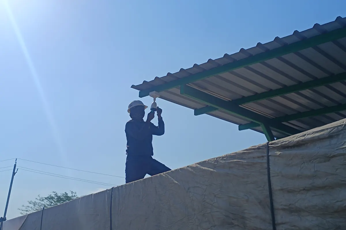 CareTech team working on a site installation